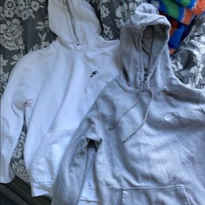 Two Nike plan sweatshirts